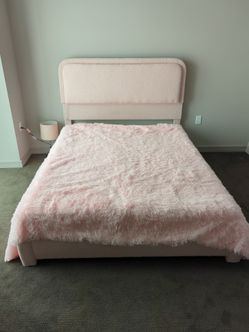 Pink full-size bed