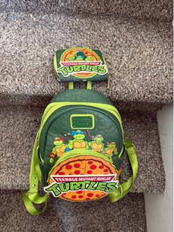 Loungefly Teenage Mutant Ninja Turtles mini backpack with pizza graphic and four turtles With wallet