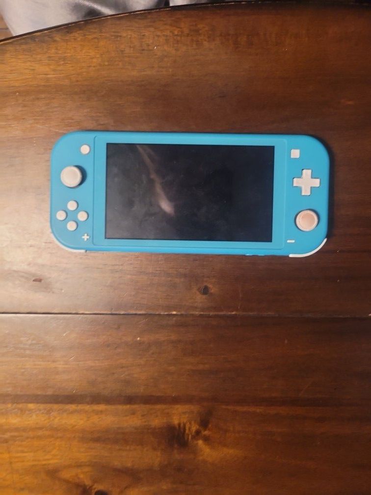 Nintendo  Switch Lite with 2 games