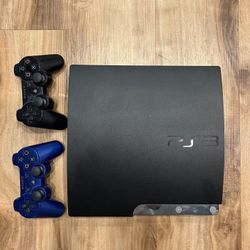 PlayStation 3 (PS3) + 2 Controllers And Cables 
