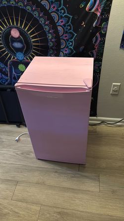 Pink mini fridge