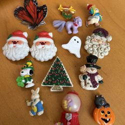 14 Assorted Holiday and Character Pins. Are your Grandkids coming during these seasons. Surprise them each Tim with a seasonal pin or send them a litt