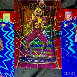 Elite Series Rookie Jake Moody #205/625, Fred Warner “Status” #182/625, Select Laser  Brandon Aiyuk Laser