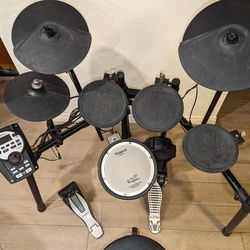 Roland electric drum set (TD-11) and throne