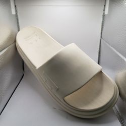 Size 11, pair of cream Billabong platform slide sandals 