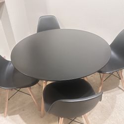 Round table with 4 chairs.