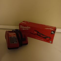 Brand new milwaukee multitude with battery and battery charging