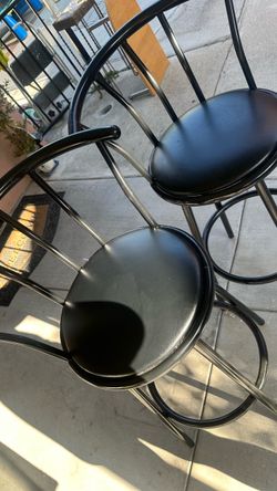 2 black Stools