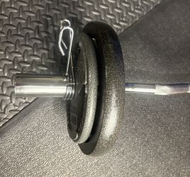 Brand New Olympic Weightlifting Equipment; Curl Bar with Pair of 25s and Pair of 10s. 90 # Brute.