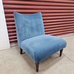 Armless blue velvet accent chair
