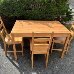 Ikea table and three chairs