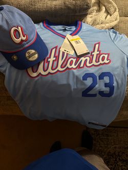 Atlanta Braves jersey and hat