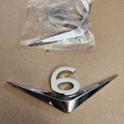 V6 Emblem
