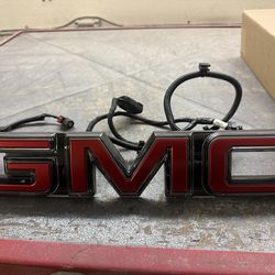 Genuine gm front illuminated gmc emblem in red