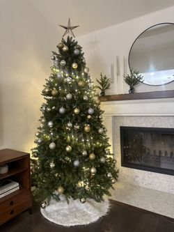 7' feet tall, Pre-Lit Faux Christmas Tree With Stand, Skirt, & 200 Lights CT200