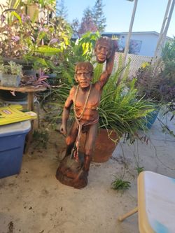 Hand carved  warrior headhunter