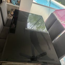 Dinner table with chairs