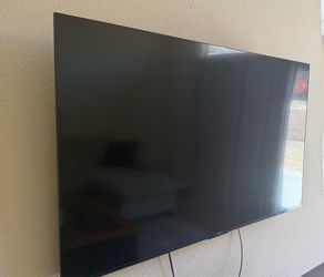 70”in TCL TV with mount