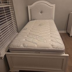 Twin bed with mattress