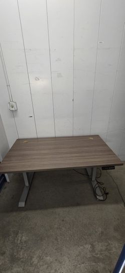 Electric Sit And Stand Ergonomic Desk disassembled for easy transport