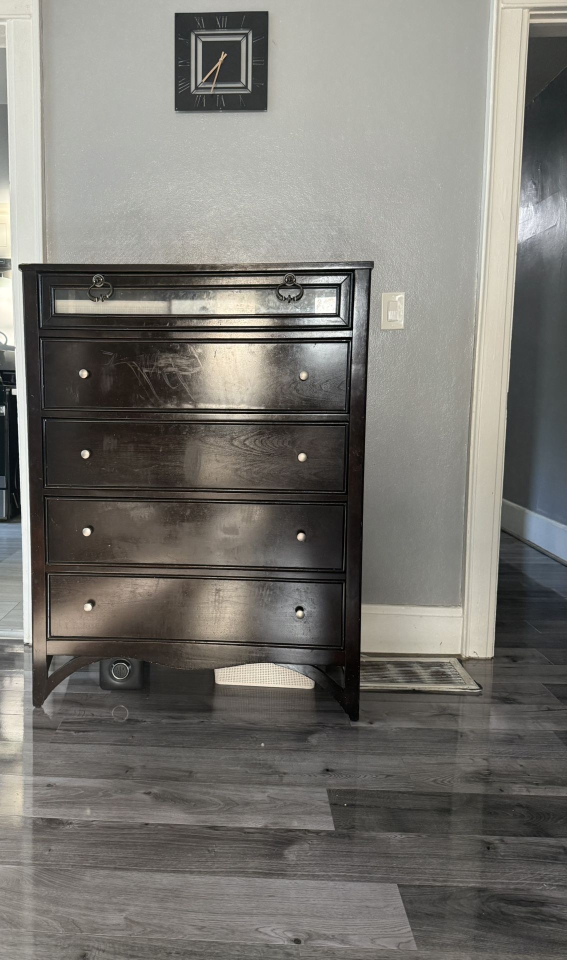 5 Drawer Black Wood Chest With Frosted Top Drawer And Curved Bottom 