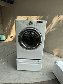 LG Tromm dryer with pedestal