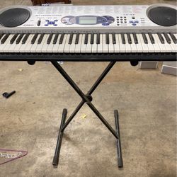 Casio Keyboard Key Lighting System And A Stand 