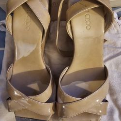 DESIGNER Jimmy Choo Wedge w/receipt. Size 8. $400.