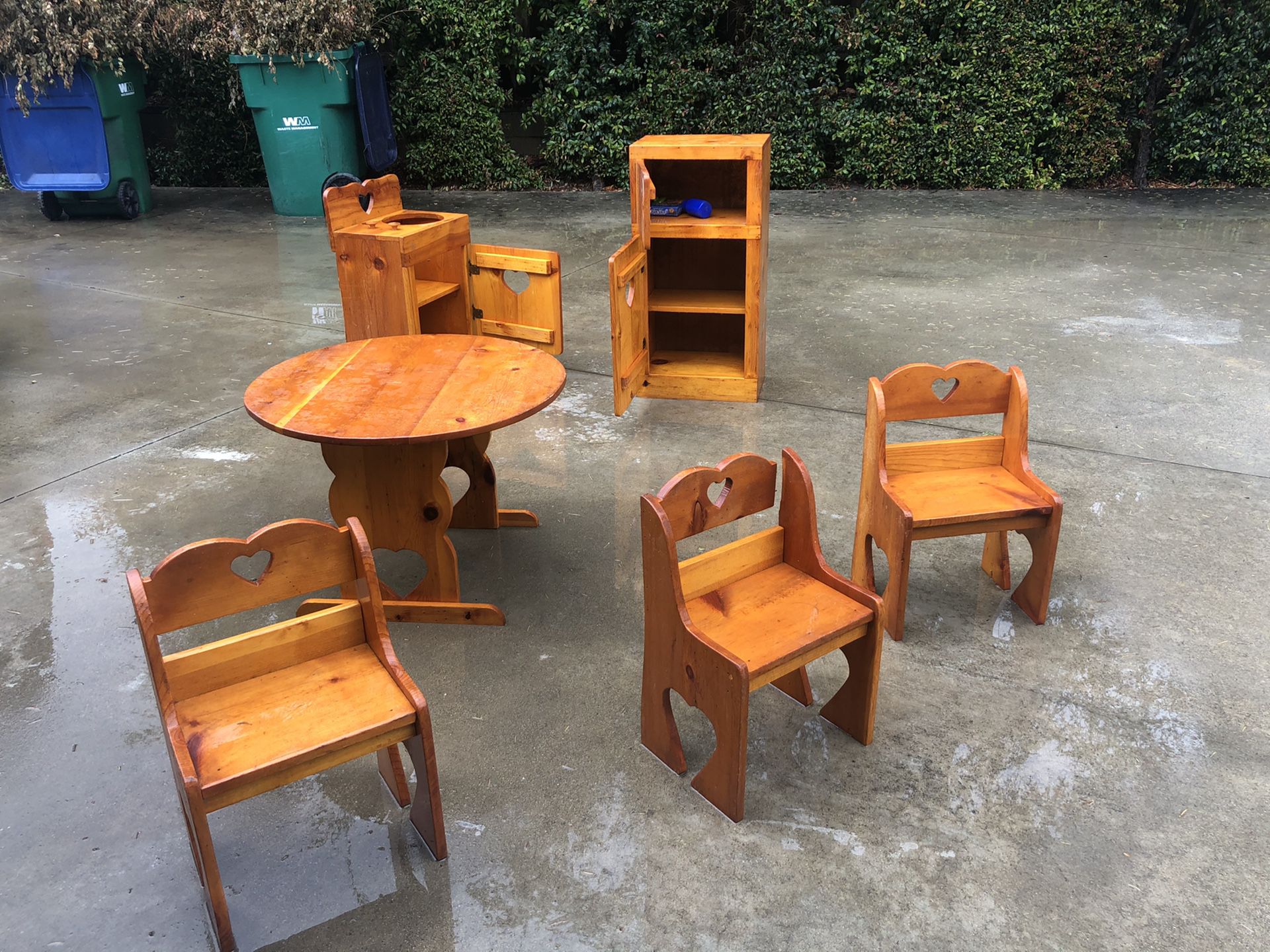 All custom wood child’s kitchen and table with chairs