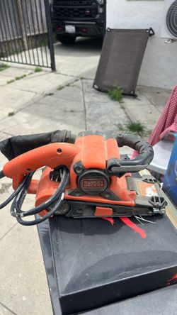 Black and decker portable belt sander.