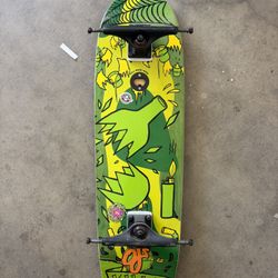 creature shaped skateboard