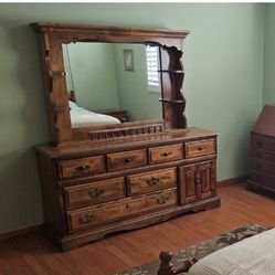 Dresser w/mirror, $175, Three Coffee tables, $200