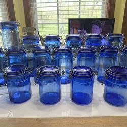 Vintage Blue colbalt glass jars with clamp tops 17 piece set ( MAKE ME AN OFFER )