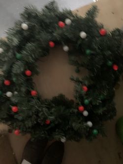Front door Christmas garland with colorful bulb