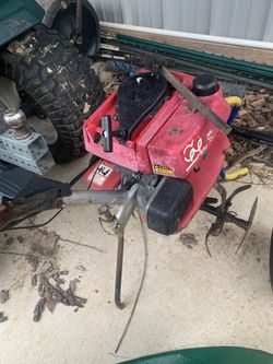 Honda F210 Mid Tine Tiller. Runs great. Warranty 