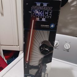 The Force unleashed ll Darth Vader  Light up Light saber Nintendo Wii. new. never used.