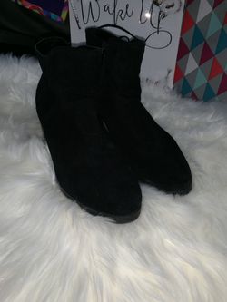 Black suede booties.