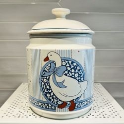 Vintage Goose with bow Large ceramic cookie jar / canister. Made in Japan stamped on bottom. 10” tall with 6” opening.  Lid has air tight rubber seal.