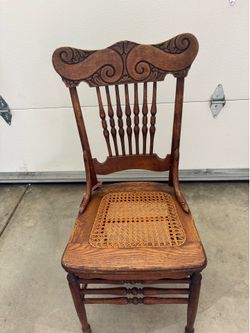Set of 6 hand carved antique dining chairs. Two need minor repairs.