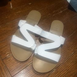 Flat white sandals, size 7