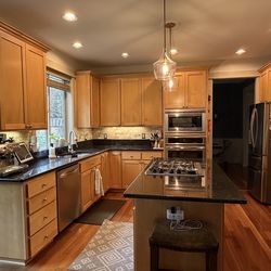 Kitchen cabinets + granite countertops + appliances
