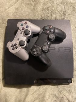 Sony PS3 Slim Console With 2 Controllers