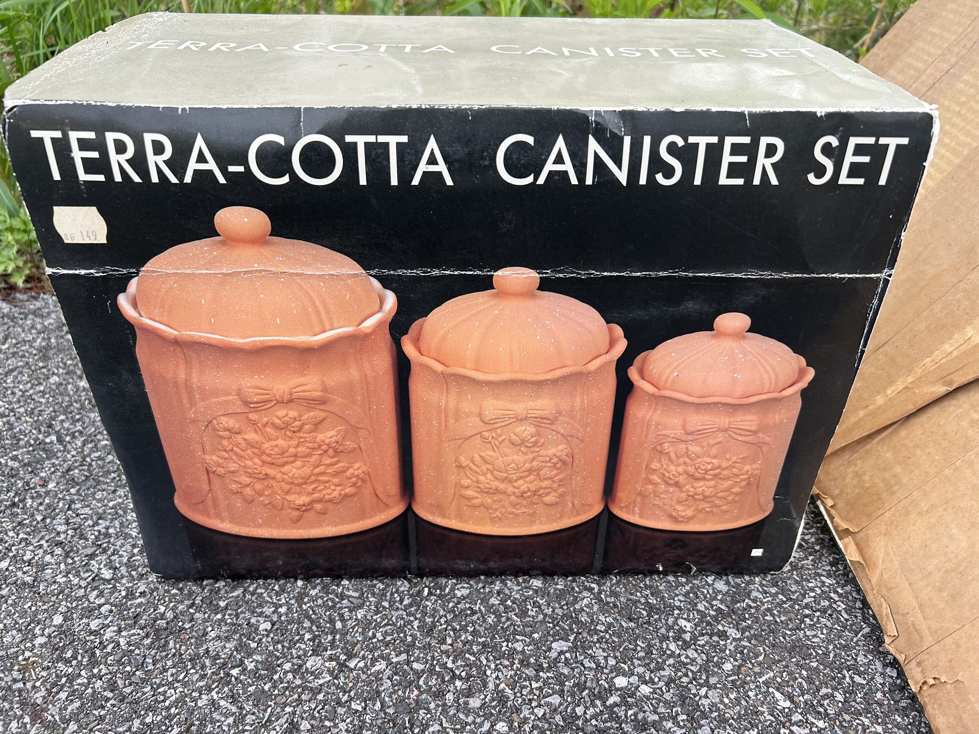 Terra cotta canister set. NIB