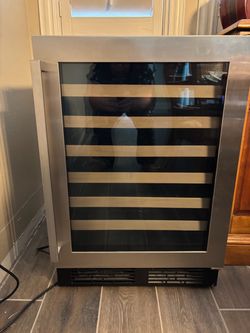 Hisense 54- bottle stainless steel wine cooler in perfect condition. Two available