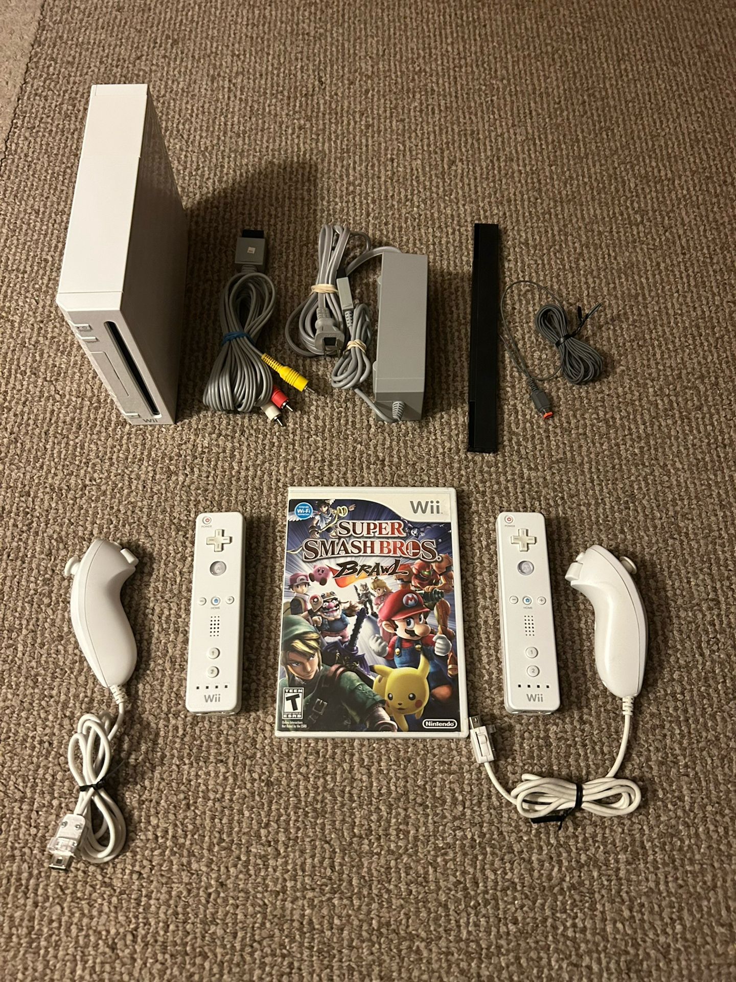 Nintendo Wii + Super Smash Bros