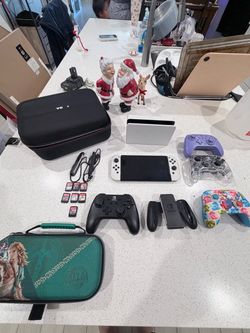 Nintendo Switch OLED Bundle with Controllers and Games