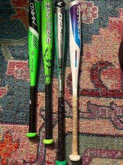 4 baseball bats. Aluminum + 1 wooden. Barely used, in excellent condition, made of aluminum, sizes 29/27/30/26 inches. I'm not selling them separately