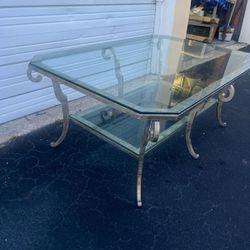 Two level beveled glass silver heavy iron coffee table.. 