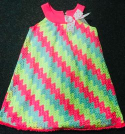 Rare  Editions artsy girls size 6 multi color chevron pattern with polka dot bow on shoulder and ruffles on hem party dress