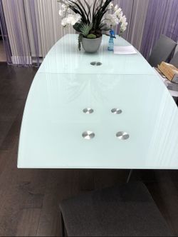 Contemporary expanding dining table.